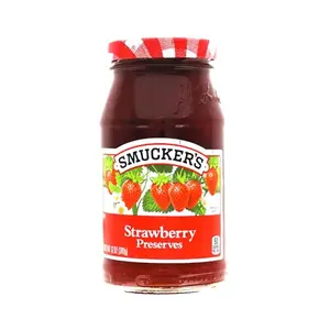 Smucker's strawberry preserves jar on a red and white checked cloth