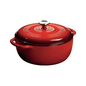 Lodge Island Spice Red Dutch Oven on wooden table
