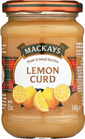 Mackays Lemon Curd 12 ounce jar with scones on the side
