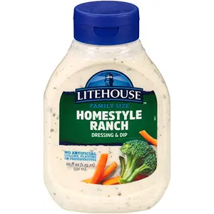 Litehouse Homestyle Ranch Dressing bottle on a picnic table with vegetable dippers