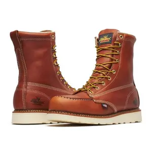 Thorogood American Heritage 8-inch steel toe work boots in tobacco leather, showcasing moc toe and flag patch