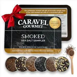 Caravel Gourmet Smoked Sea Salt Sampler Set with six small tins and wooden spoon