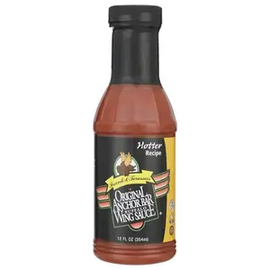 Anchor Bar Hotter Buffalo Wing Sauce bottle with dark red label