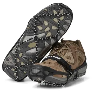 Yaktrax Pro traction cleats with coils on a winter boot