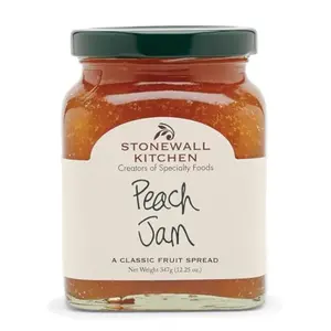 Stonewall Kitchen Peach Jam jar with spoonful of spread