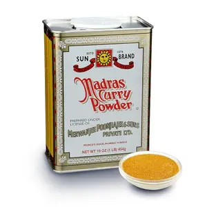Sun Brand Madras Curry Powder 1lb pack with a bowl of curry