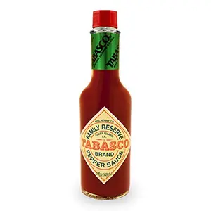 A single elegant bottle of Tabasco Family Reserve Pepper Sauce with a distinctive label