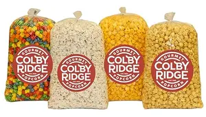 Colby Ridge popcorn assortment with white, caramel, cheese, and rainbow flavors in large bags