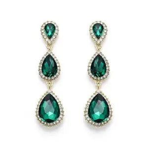Long 2.5 inch gold-tone dangle earrings with emerald color teardrop crystals, elegant chandelier