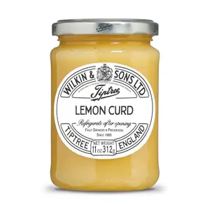 Tiptree Lemon Curd 11 ounce jar on a scone