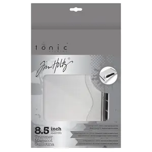 Tonic Studios 8.5 inch guillotine paper cutter on a crafting table