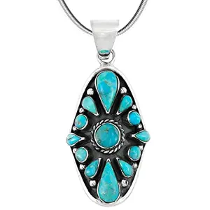 Genuine turquoise pendant on a sterling silver snake chain displayed on a black surface