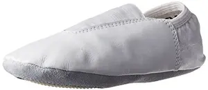 Danzcue child white leather gymnastic shoes on a mirror, showcasing soft upper and elastic ankle