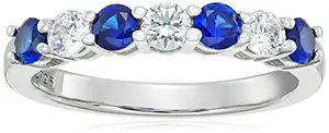 Platinum plated band ring alternating clear cubic zirconia and blue created sapphire