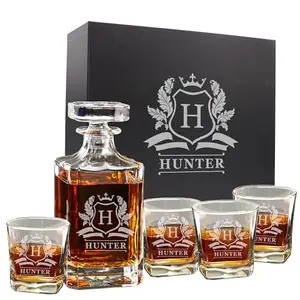 Custom engraved whiskey decanter with 4 matching glasses, perfect for VIP corporate gifts.