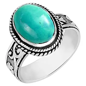 Classic turquoise ring with oval stone in silver plated setting