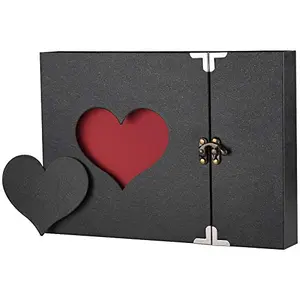 Firbon black scrapbook open showing photos on black card pages