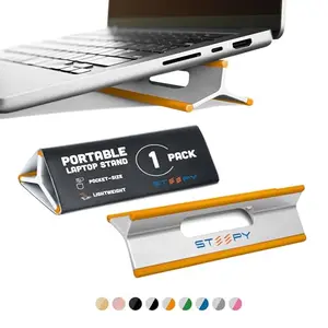Steepy orange laptop stand in tripod form, unfolded with rubber edges on a table