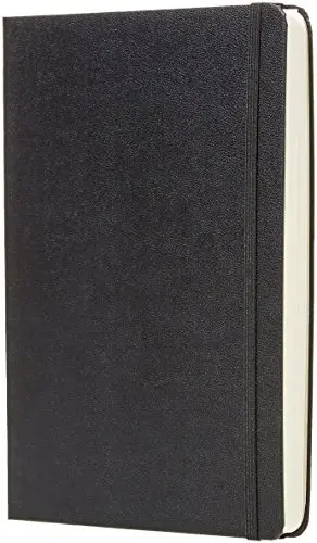 Black Amazon Basics hardcover daily planner with elastic closure and ribbon bookmark