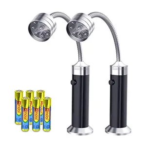 Two FIREOR grill lights attached to a barbecue grill with bright LED illumination