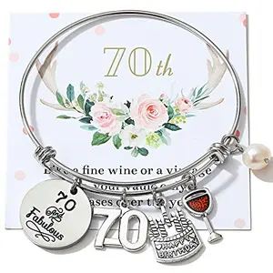 Stainless steel expandable bangle with dangling 70, cake, and wine glass charms