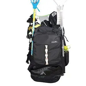 Athletico Extra Large Lacrosse Backpack in black holding two sticks and gear