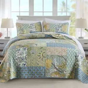 NEWLAKE 100% Cotton Patchwork Bohemian Quilt Set in green and floral pattern on a bed