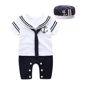 Mud Kingdom white short sleeve sailor romper with embroidered 'I am a sailor!' and hat on baby