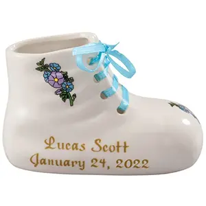 Porcelain personalized baby bootie heirloom in blue with ribbon laces