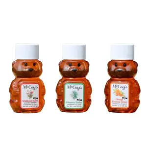 McCoy's Honey variety pack with three mini bear bottles of orange blossom, palmetto, and wildflower honey