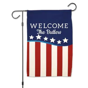 Red, white and blue personalized American flag garden flag with a customizable name or message displayed outside a home