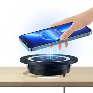 JE Make IT Simple grommet wireless charger installed in desk with phone resting on top