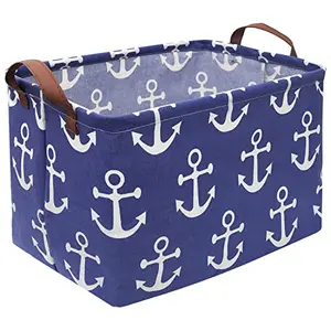 Collapsible navy blue anchor storage bin for nursery