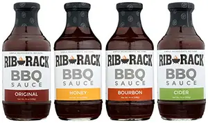 Rib Rack four-bottle variety pack on a picnic table with grilled food