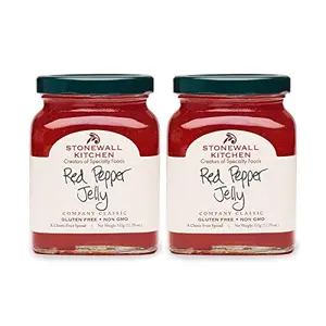 Stonewall Kitchen Red Pepper Jelly two jars on a cheese board