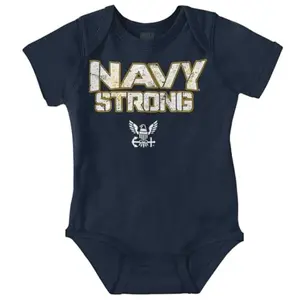 Baby wearing a white and navy romper with Navy Strong graphics
