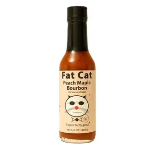 Peach Maple Bourbon hot sauce bottle with label