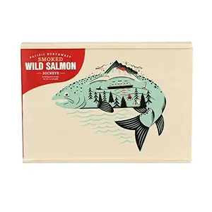 SeaBear wooden gift box with smoked salmon on a red, white, and blue themed board