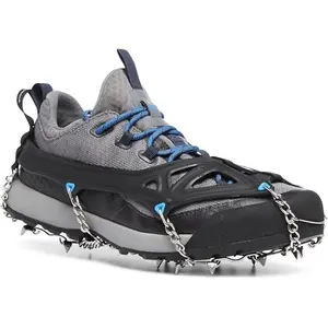 Black Diamond Access Spike traction device with stainless steel spikes on a running shoe