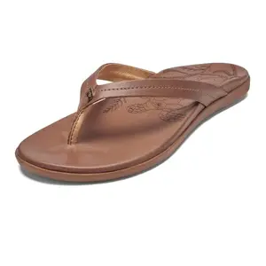 OLUKAI Honu women's tan leather beach sandal with laser-etched turtle artwork
