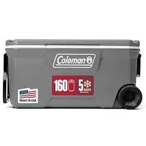 Rock grey Coleman 100-quart rolling cooler with cup holders on lid, outdoors