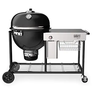 Weber Summit Kamado S6 charcoal grill in black with side table