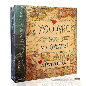Holoary magnetic photo album with world map cover and photos stuck on self-adhesive pages