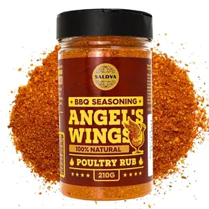 Angel's Wings BBQ Chicken Rub jar on a wooden table with chicken wings