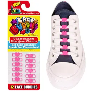 Lace Buddies emoji shoe lace charms on sneakers
