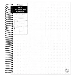 bloom daily planners dot journaling planner with spiral binding, open on a desk