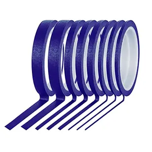 Assorted thin blue painter's tape rolls on a table
