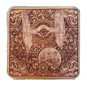 Engraver's Dungeon cherry wood wireless charger with engraved spaceship design on wooden desk