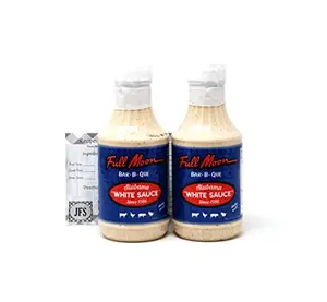 Two bottles of Full Moon white BBQ sauce with recipe card