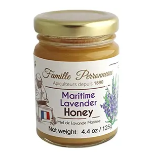 La Famille Perronneau French Maritime Lavender Honey small jar on a seaside table